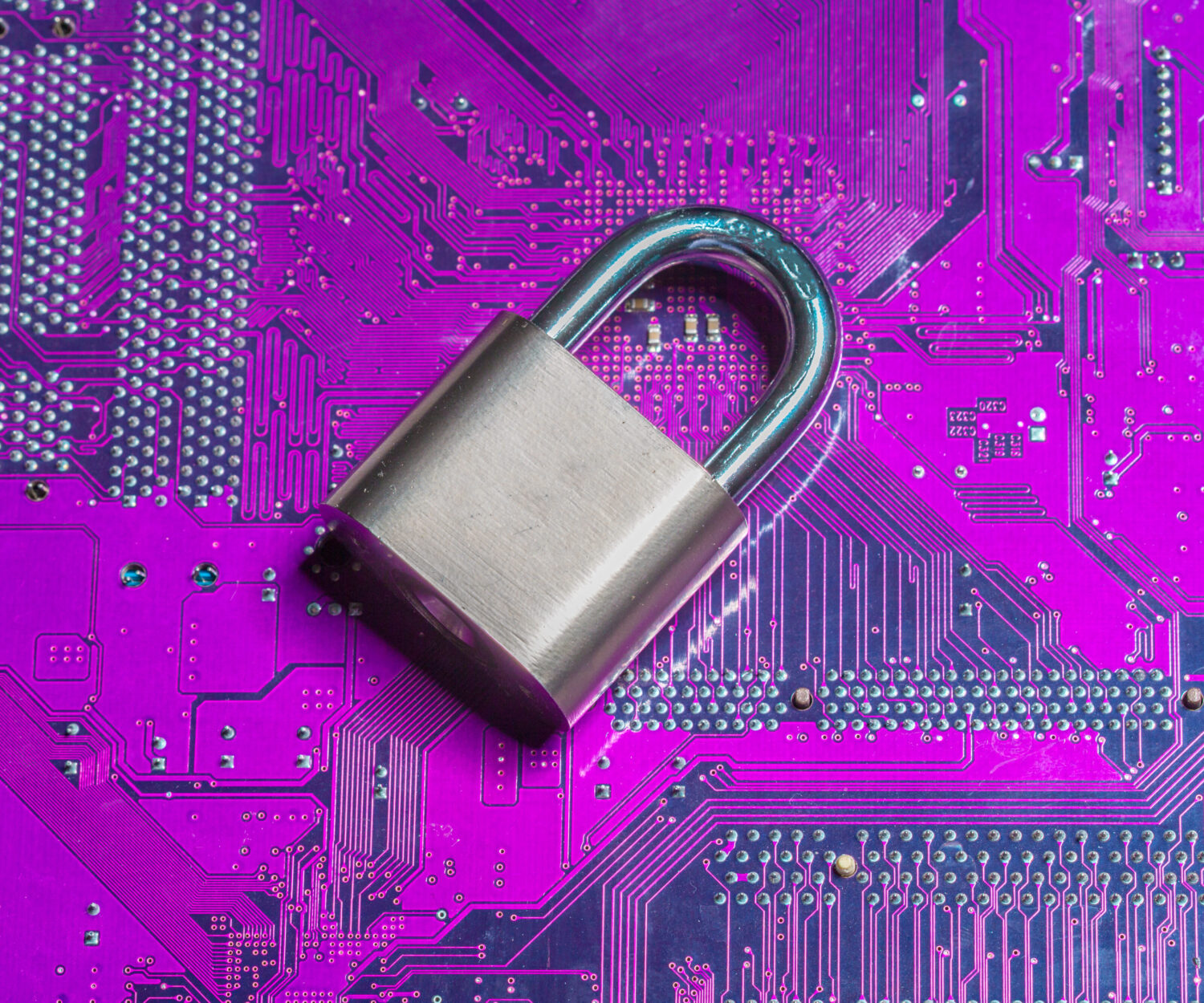 padlock on a computer circuit board